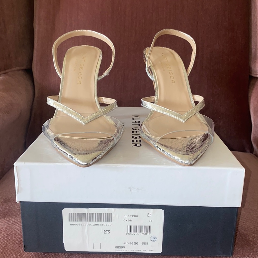 Kurt Geiger silver sling back heels.